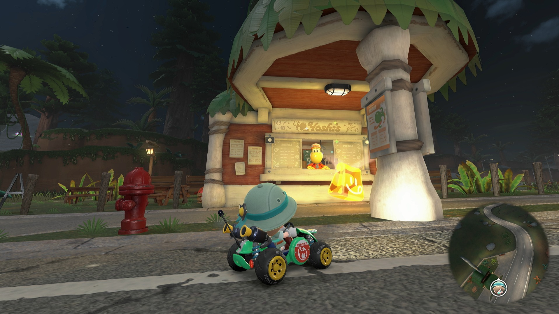 mario-kart-world-tenue-repas-exterieur-station